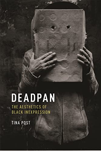 Book cover with hands holding a box obscuring a face.