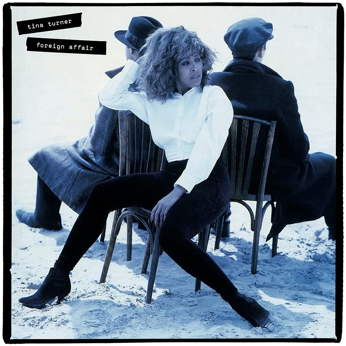 "Tina Turner's 'Foreign Affair' CD case and two discs on a white background."