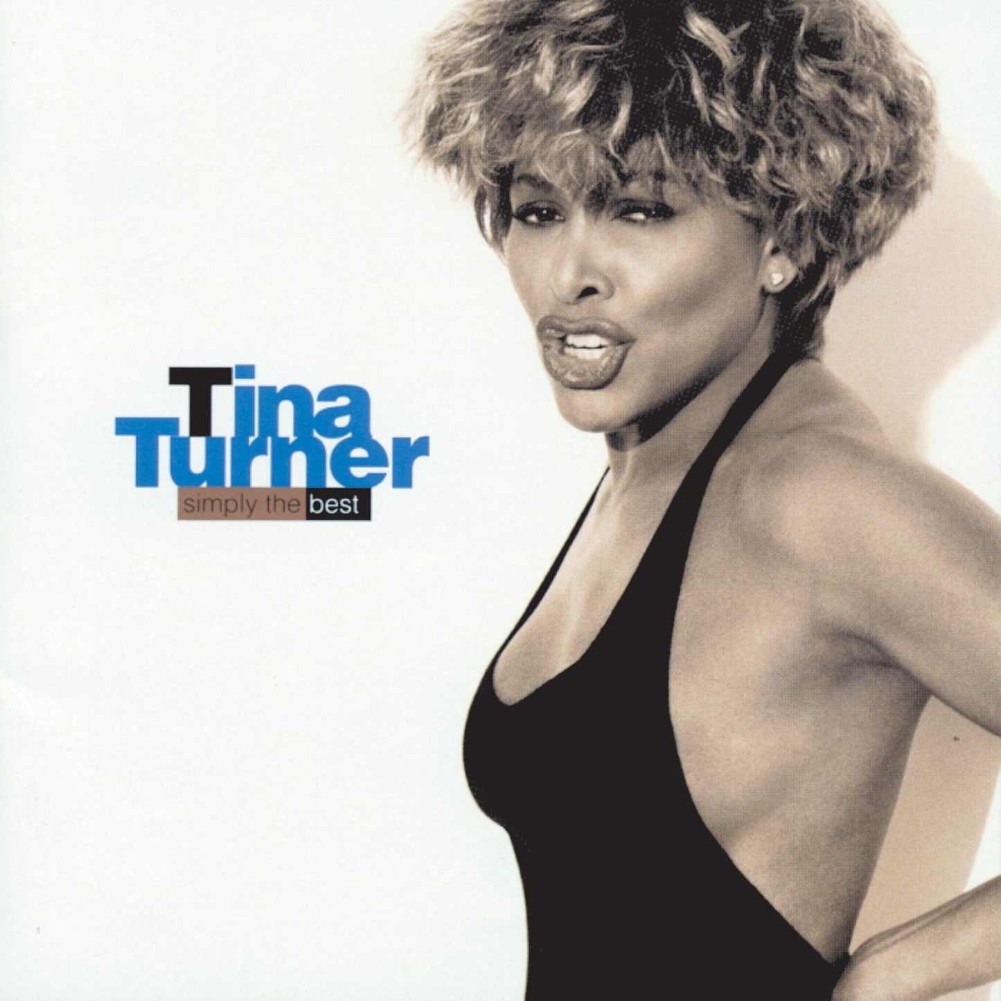 Tina Turner's album cover featuring a black-and-white photo of her in a black tank top.