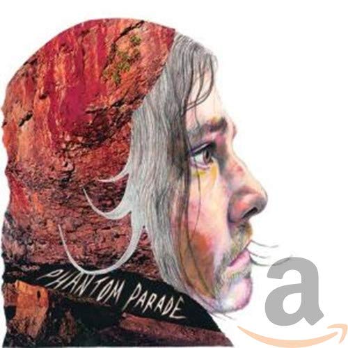 CD cover: profile of a man with long grey hair and red background.