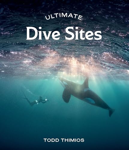 Book cover: “Ultimate Dive Sites” with a diver and orca underwater.