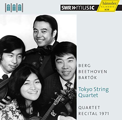 Black and white portrait of the Tokyo String Quartet holding their instruments.