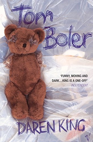 Book cover with a worn, brown teddy bear lying on crumpled plastic.