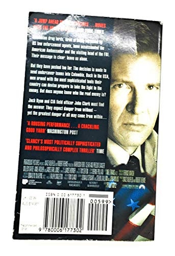 Back cover of Clear and Present Danger featuring Harrison Ford and a US flag.