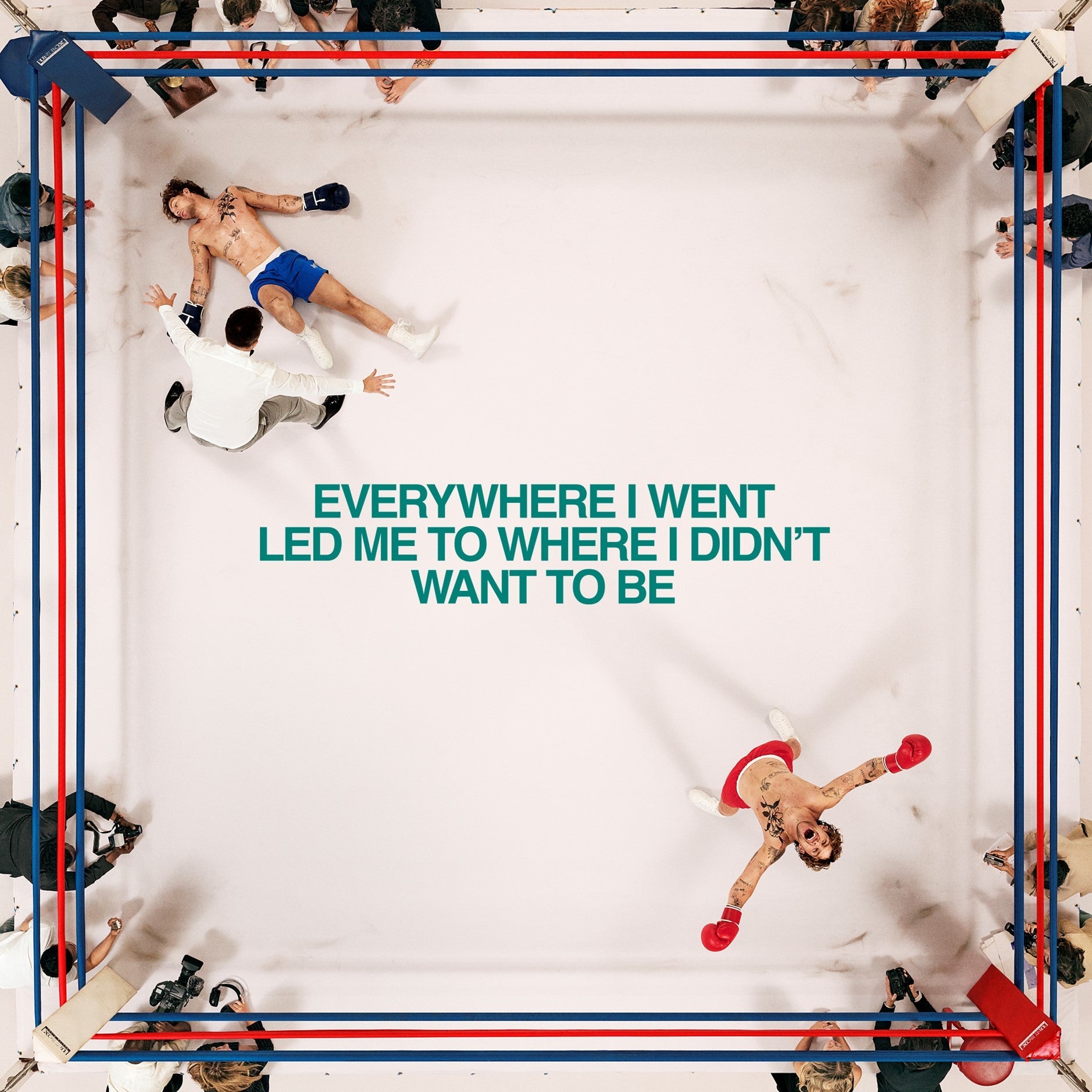 Tom Grennan album cover: man in boxing ring, others fallen around him.