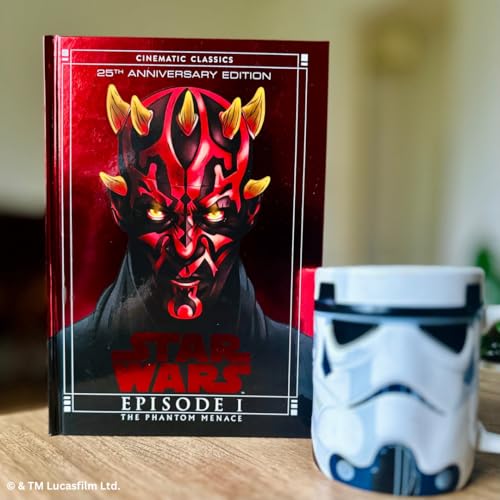 Red book cover featuring Darth Maul, with a Stormtrooper mug nearby.