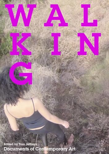 A person walks through dry grass under the large magenta title Walking.