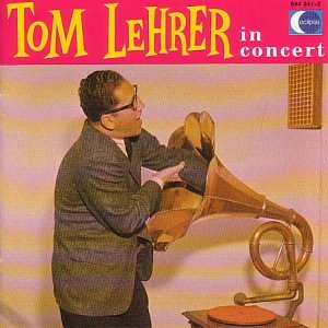 Tom Lehrer at a piano with a large, antique gramophone horn.