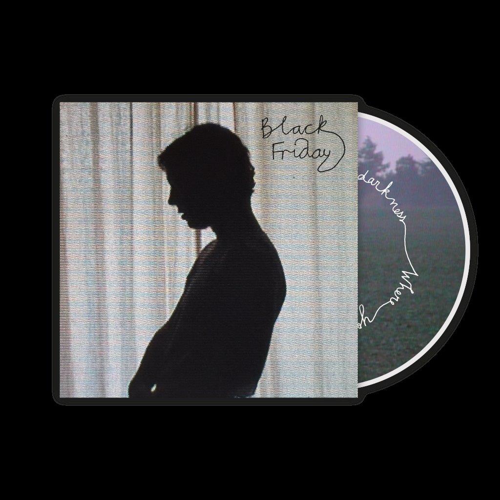 Tom Odell "Black Friday" CD cover with silhouette and disc image.
