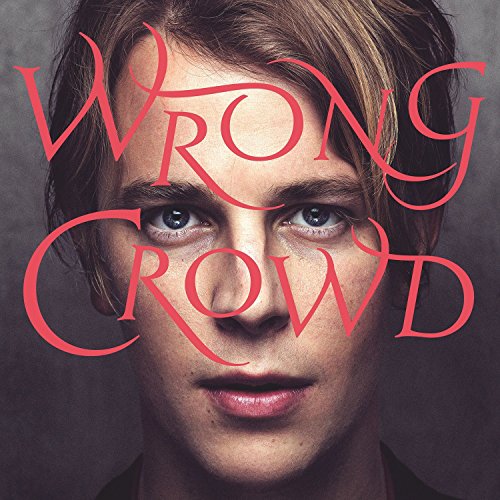 Tom Odell album cover, close-up portrait with red text overlay.