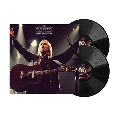 Tom Petty vinyl record set with cover image of him playing guitar.