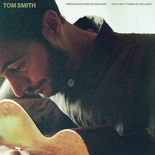 Vinyl album cover featuring a close-up portrait of Tom Smith with a guitar.
