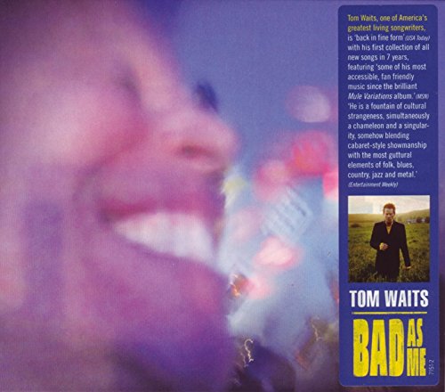 "Tom Waits album cover: blurred face, blue panel with artist name and title."