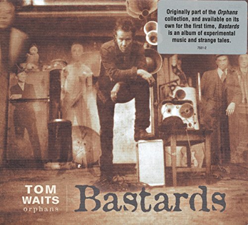 "Tom Waits Bastards vinyl album cover with sepia-toned image of man and mannequins."