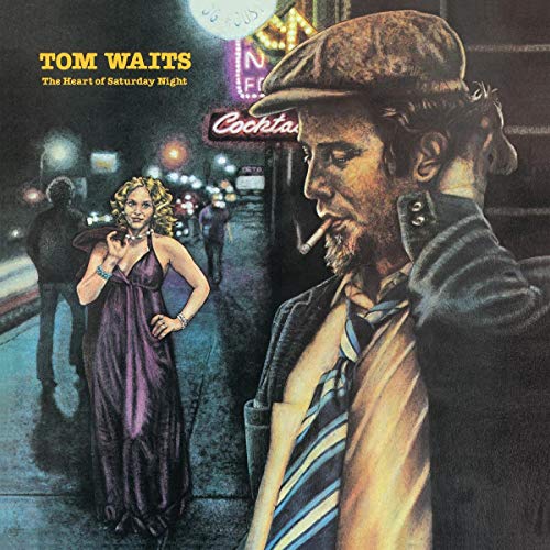 Album cover showing Tom Waits smoking in a cap with a woman in background.