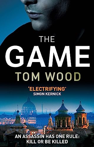 Book cover: "The Game" by Tom Wood, featuring a man and city skyline.