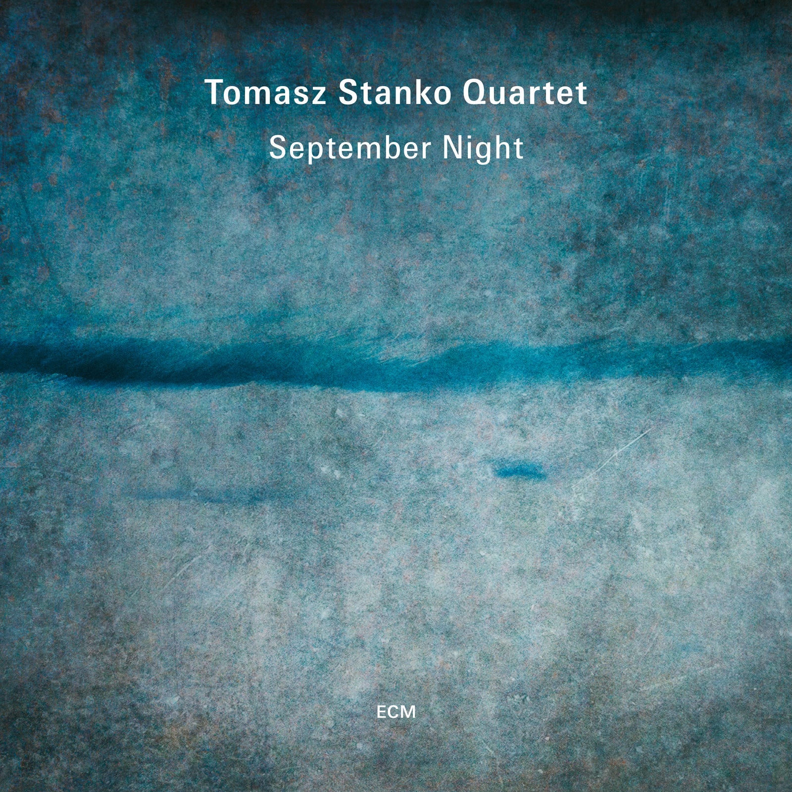Tomasz Stanko Quartet “September Night” vinyl album cover, abstract blue tones.