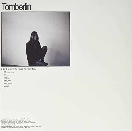 Tomberlin album cover: woman seated, muted tones, tracklist text below.
