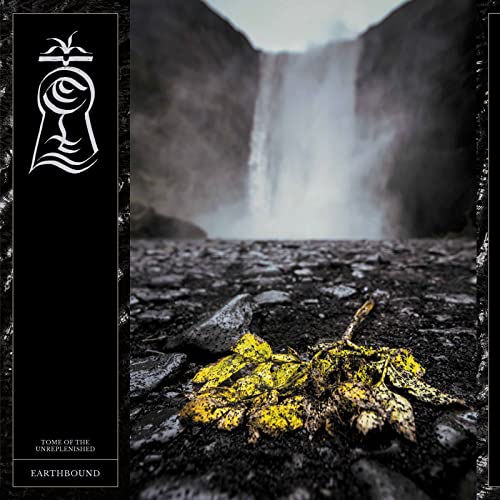 CD cover: waterfall landscape with a keyhole symbol and fallen leaves.