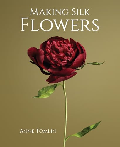 Book with color photos and illustrations on making silk flowers, likely with floral examples.