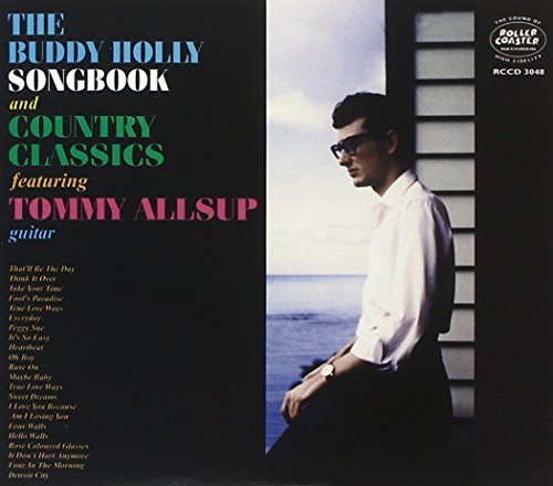 CD cover featuring Buddy Holly portrait and song list text.