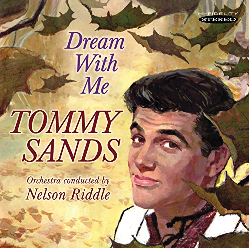 "Album cover featuring a portrait of Tommy Sands surrounded by autumn leaves."