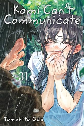 Girl with long dark hair and blue shirt on rainy day covering her face.