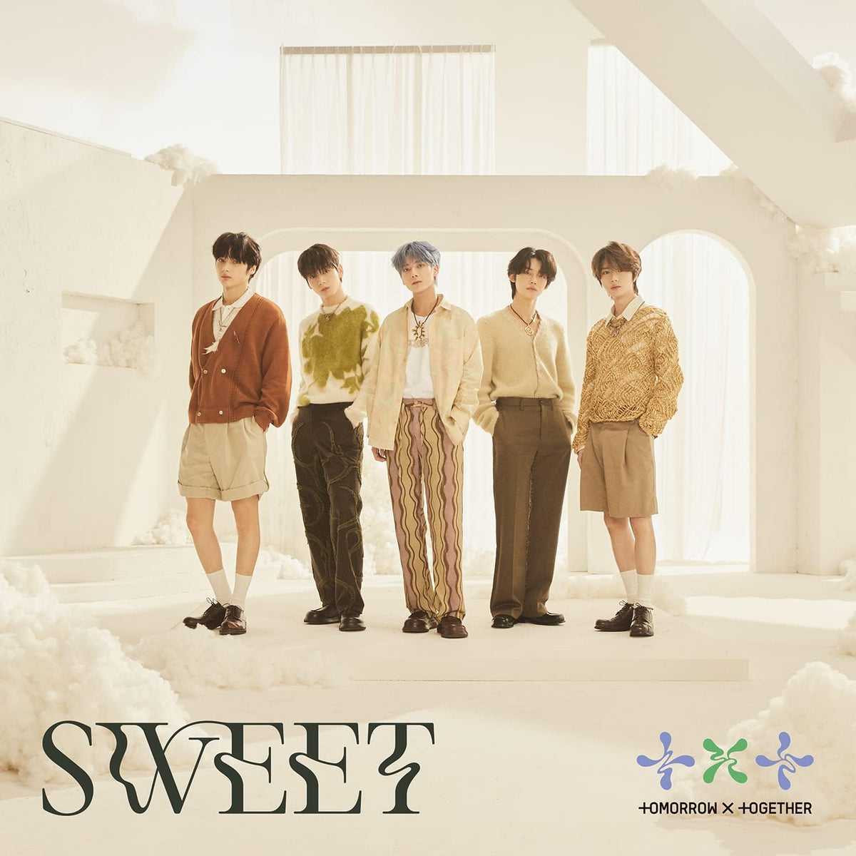 Five young men in stylish clothing stand in an archway, album art.