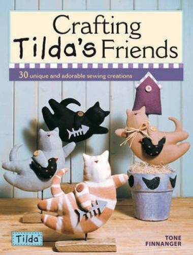 Book cover featuring handmade fabric animal toys: cats, a fox, and a bird.