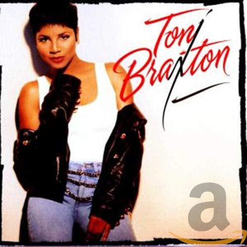 Toni Braxton album cover featuring the artist in a white tank top.