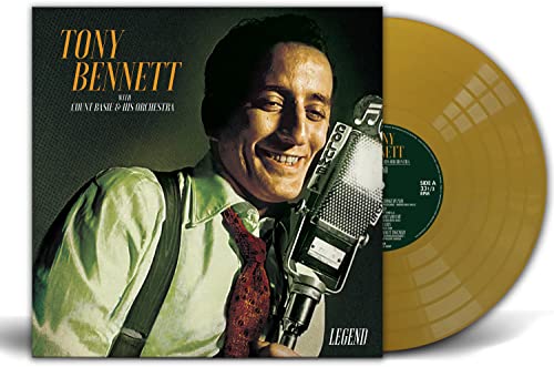 Tony Bennett album cover featuring him at a microphone with a gold vinyl record.