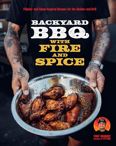 Cookbook cover featuring grilled chicken wings and a tattooed arm.