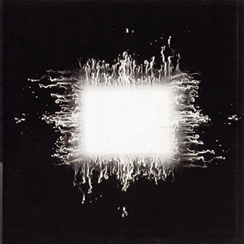 Black background with a bright white, square, abstract design resembling spray.