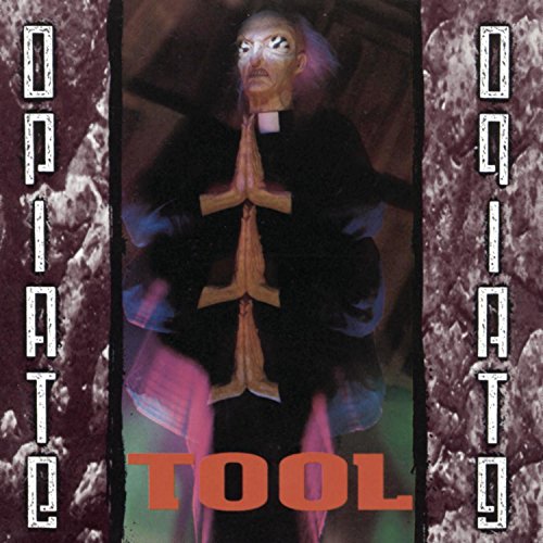 CD cover for Tool’s “Opiate” featuring a praying figure with a cross.