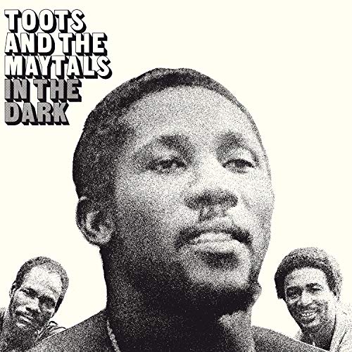 Album cover for Toots and the Maytals In The Dark featuring three band members.