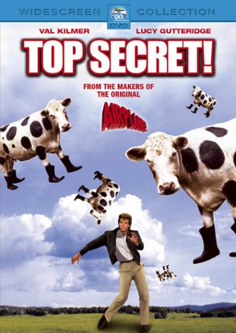 DVD cover featuring a man being lifted by flying cows against a blue sky.