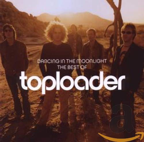 Toploader band portrait on CD cover with desert landscape background.
