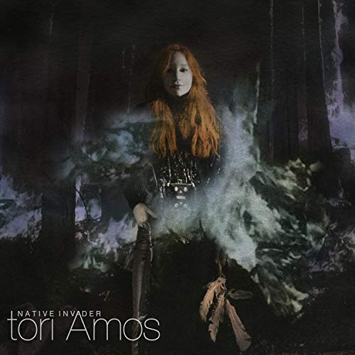 Tori Amos album cover, portrait in a misty forest setting.