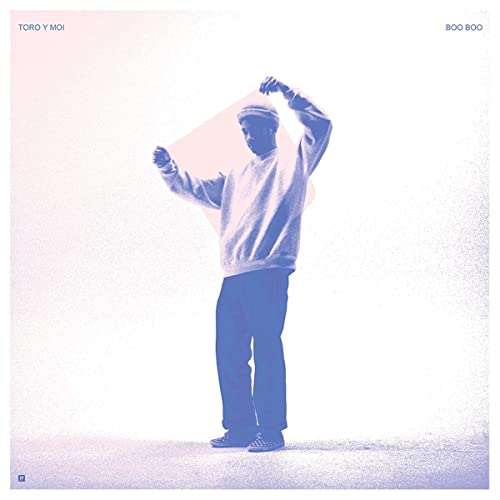 Album cover for Toro Y Moi's "Boo Boo" featuring a man with arms raised.