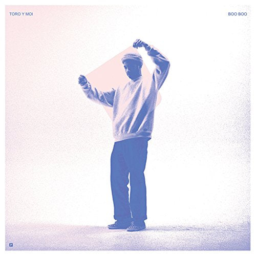 "Toro y Moi's vinyl album cover featuring a man holding a translucent pink square."