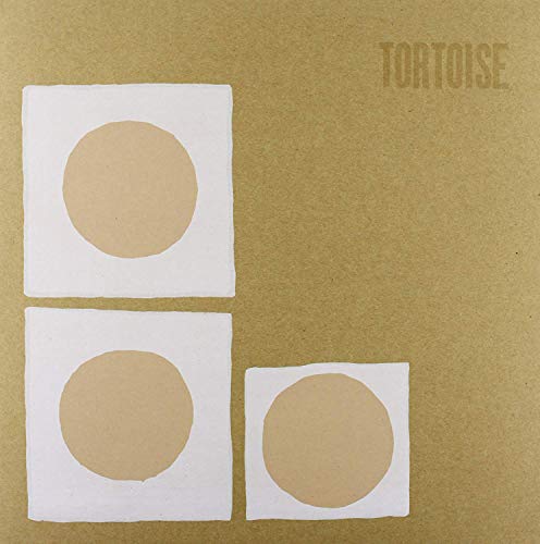 Vinyl record cover with stacked squares and concentric circles.