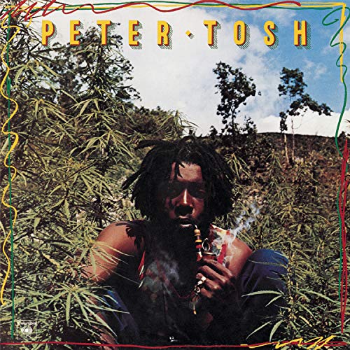 Peter Tosh album cover, "Legalize It", featuring a man smoking outdoors.