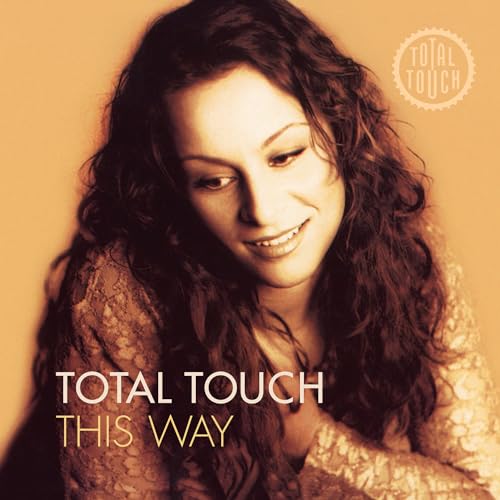 Vinyl album cover featuring a smiling woman with wavy brown hair.