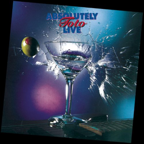 Album cover for "Toto - Absolutely Live" showing a martini glass with splashing liquid.