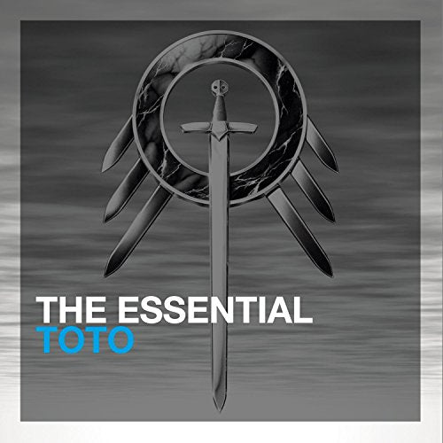 Toto's "The Essential" CD cover: sword and wings on gray background.