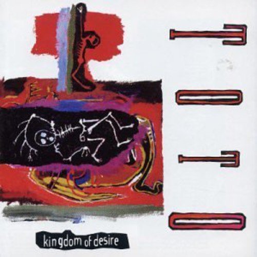 Toto’s “Kingdom of Desire” CD cover with abstract red, black, and blue art.