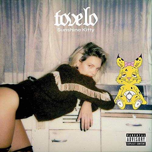 Tove Lo album cover featuring a woman and cartoon yellow lynx.