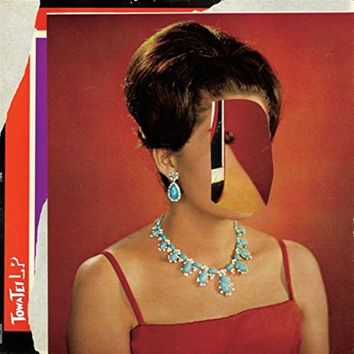 Record cover featuring a woman with a red and black geometric face.