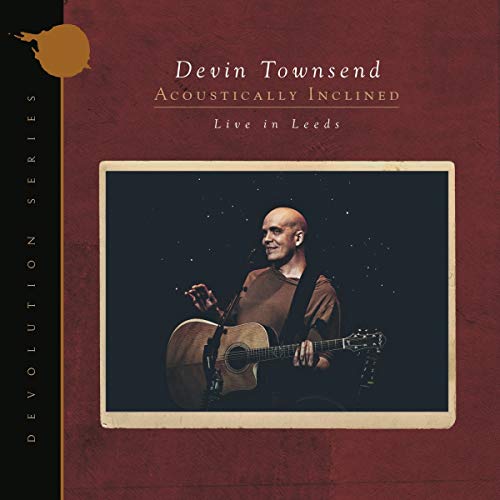 Devin Townsend album cover featuring a man playing an acoustic guitar.