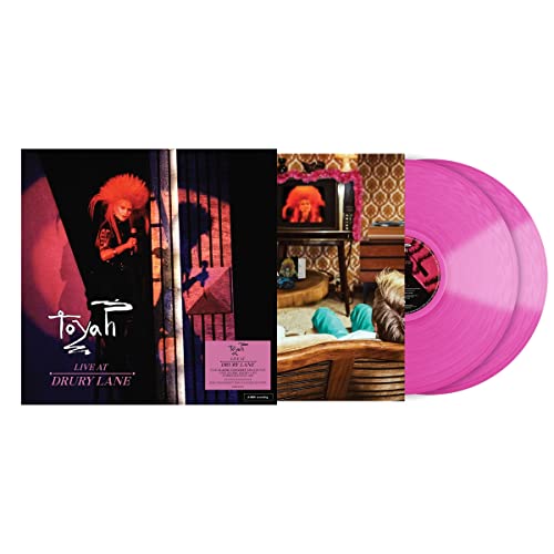 Toyah album cover and semi-transparent pink vinyl record displayed together.